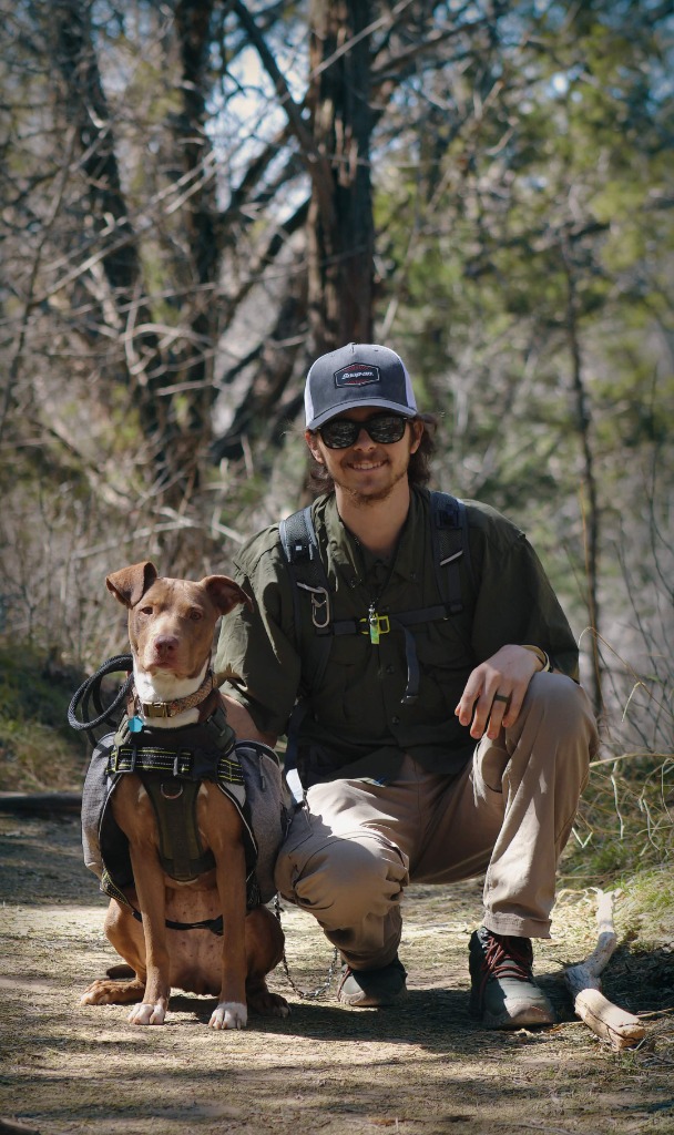 Man and his dog on a hike